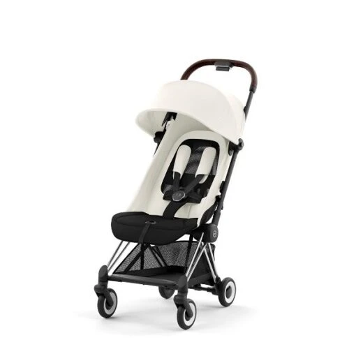 CYBEX Coya Chrome Dark Brown Off White -Roba Verkäufe 2024 cyb 23 int y045 coya ofwh chbr withoutinlay